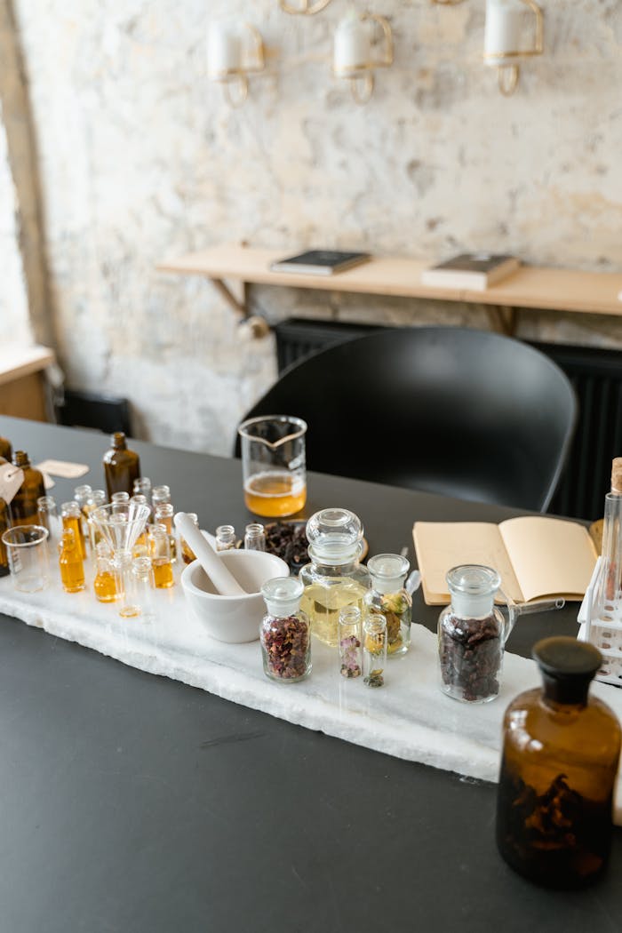 services-01 A sophisticated arrangement of aromatic oils, herbs, and natural ingredients for wellness and relaxation.